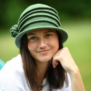 15s 0961 boiled wool cloche hat with asymmetrical pleats and flower ti